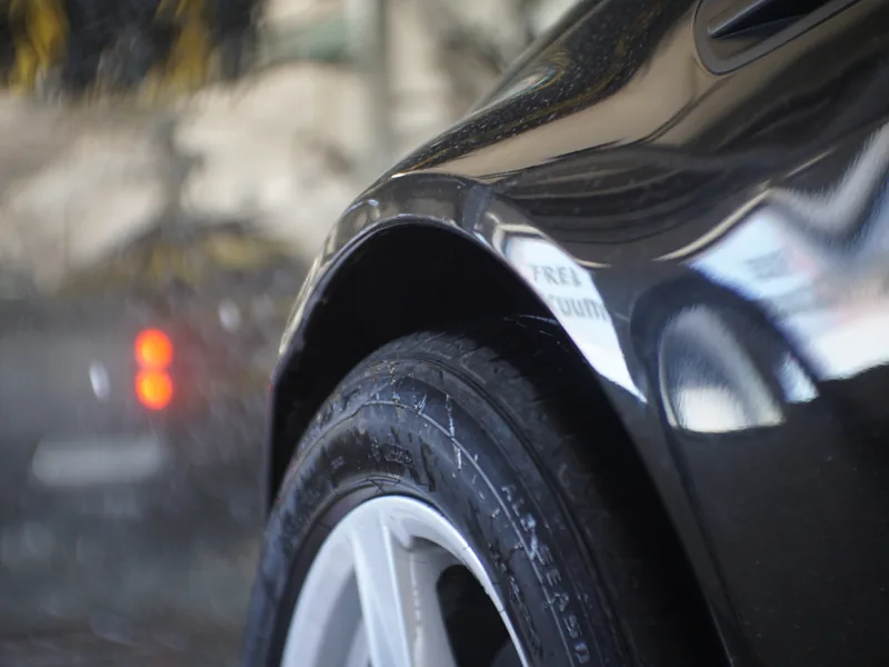 A freshly washed car with a clean, glossy finish