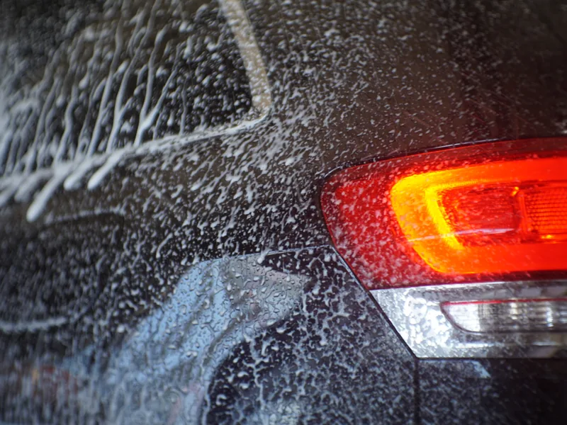 A freshly washed car with a clean, glossy finish