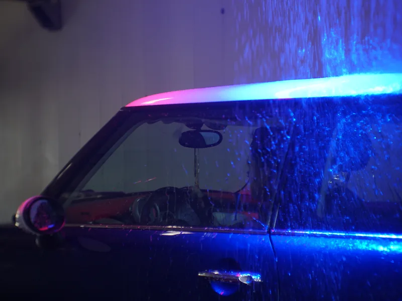 A freshly washed car with a clean, glossy finish